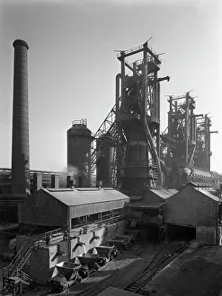 Chimney Prints: Molten steel being poured into rail trucks at the Stanton Steelworks