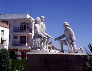 Monument to remember the repopulated of this lands dedicated to Carlos III (1716-1788)