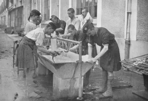 Bending Forwards Gallery: The morning toilet on the Continent, 1914
