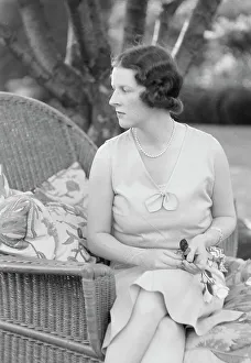 Sun Lounger Prints: Moseley, F.S. Mrs. seated outdoors, 1931 June 14. Creator: Arnold Genthe