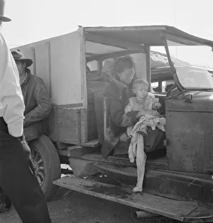 Mother and baby of family on the road, Tulelake, Siskiyou County, California, 1939. Creator: Dorothea Lange