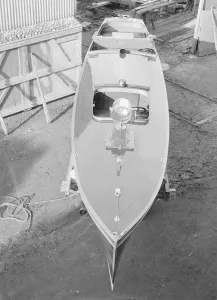 Boatbuilding Prints: Motor launch in boatyard, 1913. Creator: Kirk & Sons of Cowes