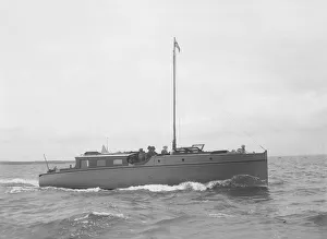 Motor Yacht Prints: The motor yacht Cygnet under way, 1922. Creator: Kirk & Sons of Cowes
