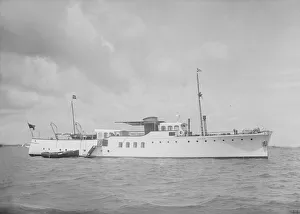 The motor yacht Wilma at anchor, 1936. Creator: Kirk & Sons of Cowes