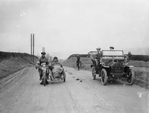 Sidecar Prints: A motorcycle and sidecar passing a car and cyclist on the road
