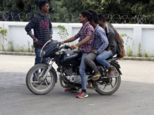 Northern Gallery: Motorcyclist with passengers, Uttarakhand India. Creator: Unknown