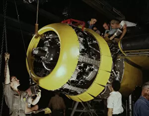 North American Aviation Gallery: Mounting motor on a Fairfax B-25 bomber, North American Aviation, Inc. Inglewood, Calif. 1942
