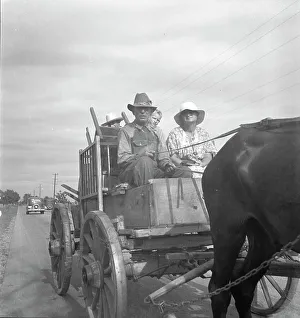 Denim Prints: Moving day on the Delta cotton lands, Arkansas, 1936. Creator: Dorothea Lange