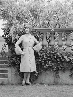 Portrait Photographs Prints: Moylair, Catherine, Miss, standing outdoors, 1928 Creator: Arnold Genthe