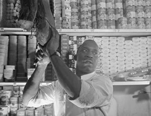 Grocers Gallery: Mr. J. Benjamin, a store owner, Washington, D.C. 1942. Creator: Gordon Parks