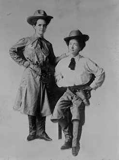 Cowboy Prints: Mrs. Bessie Jenkins and Mrs. Cary Seely dressed up in cowboy outfits