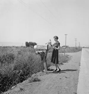 Telecommunication Gallery: Mrs. Bouchey gets the morning mail, Washington, Yakima Valley, near Toppenish, 1939