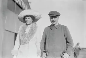 Hands In Pockets Prints: Mrs. Craig Biddle and J.A. Armstrong walking together, 1910. Creator: Bain News Service
