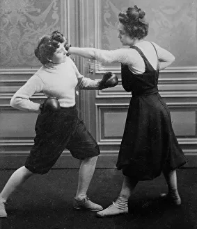 Sportswomen Prints: Mrs. Edwards & Frl. Kussin [boxing], 1912. Creator: Bain News Service