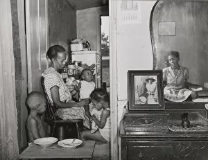 Housing Conditions Gallery: Mrs. Ella Watson, a government charwoman... Washington, D.C. 1942. Creator: Gordon Parks