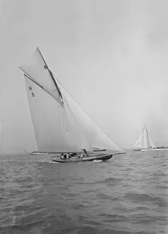 8 Metre Collection: Mrs GA Shenley at the helm of the 8 Metre class Spero (H8). Creator: Kirk & Sons of Cowes