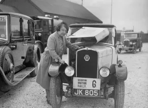 Motor Maintenance Gallery: Mrs JW McClintock with her Triumph saloon at the B&HMC Brighton Motor Rally, 1930
