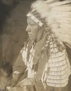 Sioux Prints: Mrs. Lame Dog, 1905. Creator: Edward Sheriff Curtis
