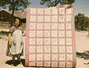 New Mexico United States Of America Gallery: Mrs. Bill Stagg with state quilt that she made, Pie Town, New Mexico. 1940. Creator: Russell Lee