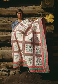 Mrs. Bill Stagg with state quilt, Pie Town, New Mexico, 1940. Creator: Russell Lee
