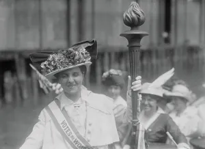 Suffragettes Prints: Mrs. Van Winkle and Suffrage torch, between c1910 and c1915. Creator: Bain News Service