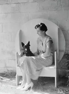 Folding Prints: Mrs. Walter Fletcher with dog, seated outdoors