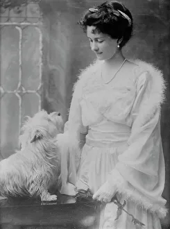 Looking At Prints: Mrs. Wm. Phillips, between c1910 and c1915. Creator: Bain News Service