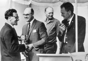 Beaulieu Collection: Murray Walker in 1963, Lord Montagu in background. Creator: Unknown