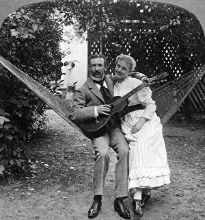 Couple Gallery: The Musical Pair in the Hammock.Artist: American Stereoscopic Company
