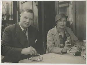 Natalia Goncharova and Mikhail Larionov at the Restaurant Petit Saint-Benoît, 1932. Creator: Anonymous