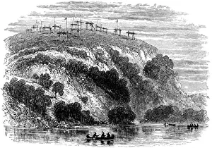 Native North American burial ground, showing the dead on raised platforms, 1876