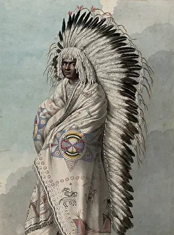 North American Prints: Native North American costume: a man wearing a decorated robe and a feather headdress