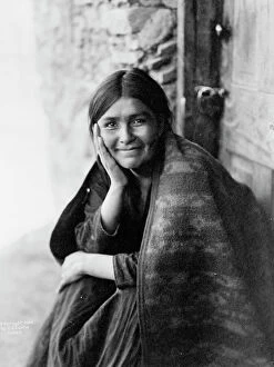 Leaning On Elbow Collection: A Navaho smile, c1904. Creator: Edward Sheriff Curtis