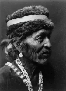 Navaho Prints: Navajo with fur cap, c1905. Creator: Edward Sheriff Curtis