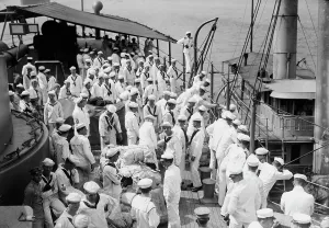 Cruiser Prints: Naval Reserve leaving USS Seattle, between c1910 and c1915. Creator: Bain News Service
