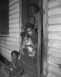 Overcrowded Prints: Negro children in the front door of their home