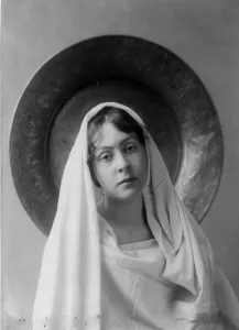 Neith Boyce Hapgood, half-length portrait, facing front, wearing shawl... between 1890 and 1910. Creator: Frances Benjamin Johnston
