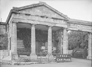 Nash Collection: Neoclassical facade with Free Car Park sign, c1935. Creator: Kirk & Sons of Cowes