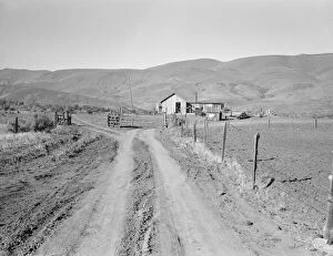 Yard Gallery: A new house for descendant of old Idaho...Ola self-help sawmill co-op, Gem County, Idaho, 1939