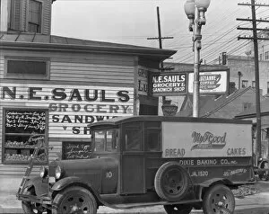 Shop Front Collection: New Orleans street corner, Louisiana, 1936. Creator: Walker Evans