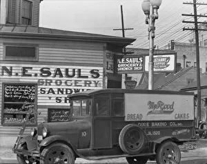 Grocers Prints: New Orleans street corner, Louisiana, 1936. Creator: Walker Evans