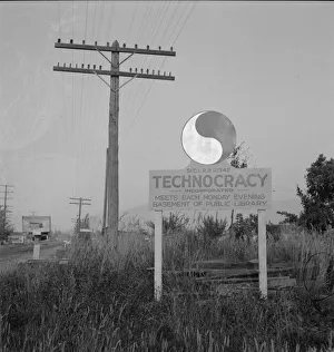 Notice Prints: New sign, erected seven years after Howard Scott talked of a