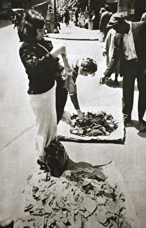 New York street trader selling stockings, USA, c1920s-c1930s