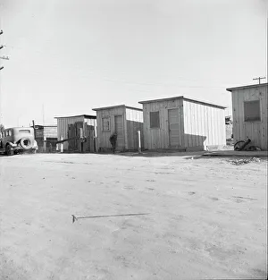 Huts Prints: Newly-built cabins, rent five dollars per month