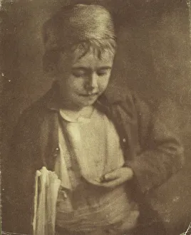 Brownell Prints: Newsboy looking at coins in his hand
