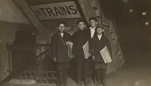 Employment Prints: Four Newsies at an Entrance to the Subway, New York City, 1910. Creator: Lewis Wickes Hine