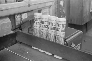 Walker Evans Gallery: Newspapers for sale, 61st Street between 1st and 3rd Avenues, New York, 1938. Creator: Walker Evans