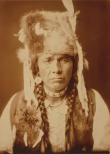 Flathead Prints: Nez Percé with furcap, c1904. Creator: Edward Sheriff Curtis