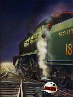 The Night Journey. A mixed-traffic locomotive of the Southern Railway at a cross-over, 1935