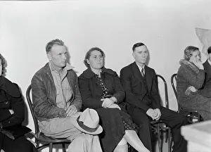 Borrowing Prints: Night meeting in the FSA office, Tulare County, California, 1938. Creator: Dorothea Lange